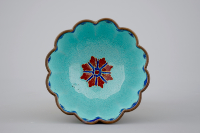Chinese Canton enamel: two plates and a cup with saucer, 19th C.