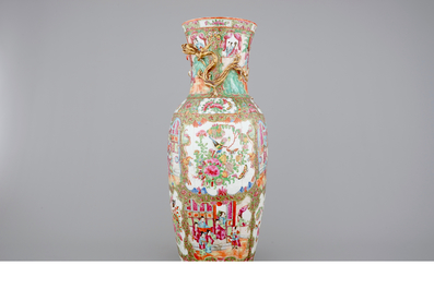 A tall Chinese Canton rose medallion vase with swirled mouth, 19th C.