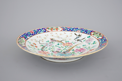 A massive Chinese Canton porcelain famille rose dish with birds, 19th C.