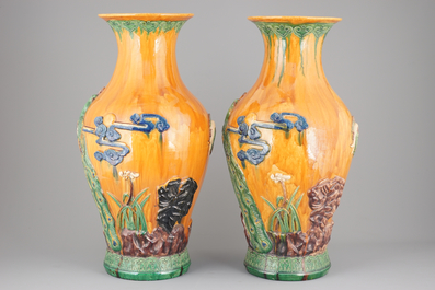 A pair of very tall Chinese sancai glazed vases, 1st half 20th C.