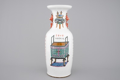 A tall Chinese vase with incense burners and calligraphy, 19th C.