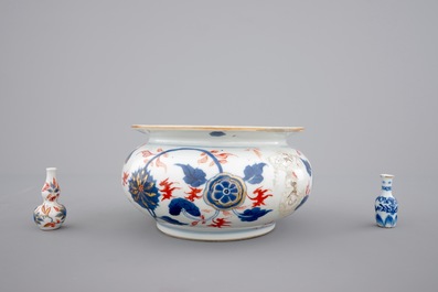 Four Chinese imari plates, two miniature vases and a bourdalou, 18th C.