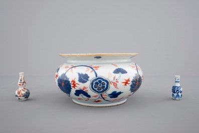 Four Chinese imari plates, two miniature vases and a bourdalou, 18th C.