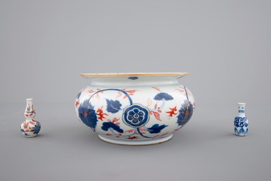 Four Chinese imari plates, two miniature vases and a bourdalou, 18th C.