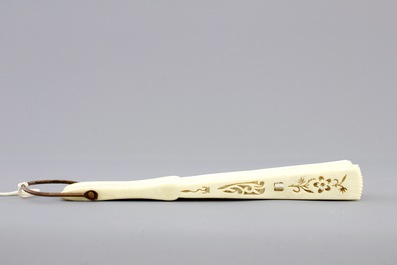 Two Chinese Canton carved and pierced ivory fans, 19th C.