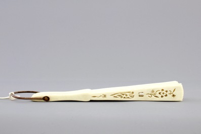 Two Chinese Canton carved and pierced ivory fans, 19th C.