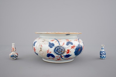 Four Chinese imari plates, two miniature vases and a bourdalou, 18th C.