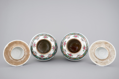 A pair of Chinese vases with covers with playing boys, 19th C.