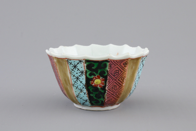 A Chinese famille rose porcelain cup and saucer with fishermen, Yongzheng, 1722-1735