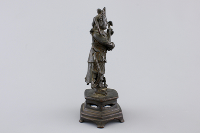 A Chinese bronze sculpture of a musician, Ming Dynasty, 16/17th C.