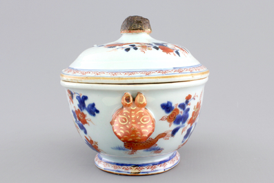 A Chinese porcelain imari tureen and cover on stand, decorated with fish, 18th C.