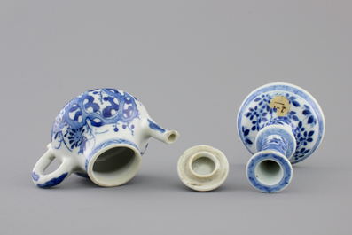 A Chinese blue and white porcelain candlestick and a miniature teapot, 18th C.