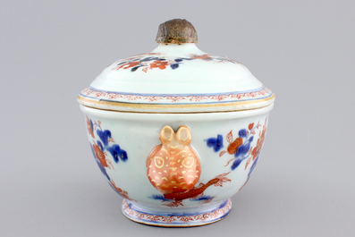 A Chinese porcelain imari tureen and cover on stand, decorated with fish, 18th C.