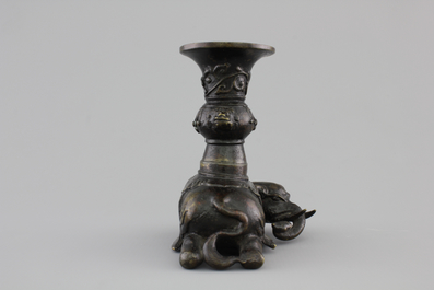 A Chinese bronze incense burner modeled as a reclining elephant, Ming Dynasty, 16/17th C.