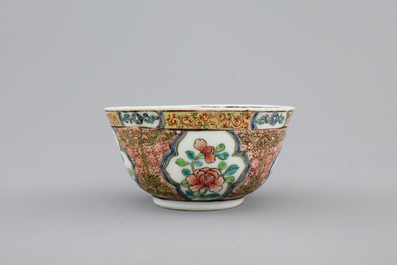 Two Chinese cups and saucers together with a faux-bois saucer, Yongzheng, 1722-1735