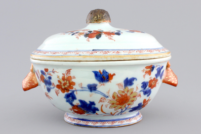 A Chinese porcelain imari tureen and cover on stand, decorated with fish, 18th C.