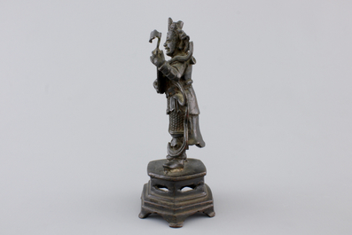 A Chinese bronze sculpture of a musician, Ming Dynasty, 16/17th C.