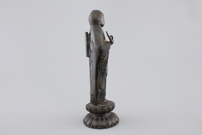A bronze figure of a Guanyin on lotus flower, Ming Dynasty, 16/17th C