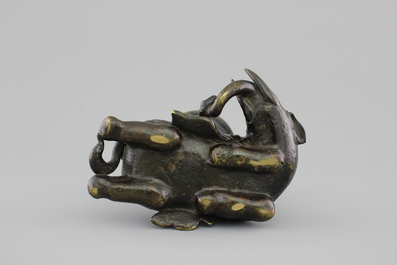 A Chinese bronze incense burner modeled as a reclining elephant, Ming Dynasty, 16/17th C.