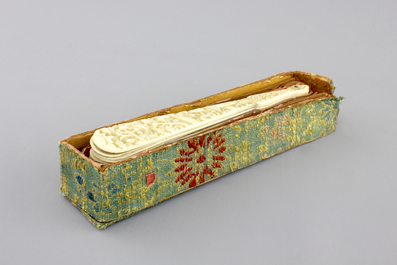 A Chinese Canton carved ivory fan in original presentation box, 19th C.