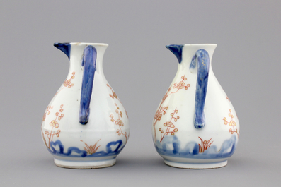 A pair of Japanese Arita porcelain oil and vinegar jugs, 18th C.