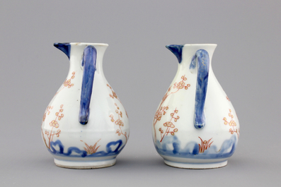 A pair of Japanese Arita porcelain oil and vinegar jugs, 18th C.