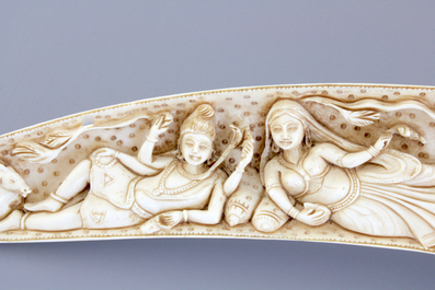 A highly unusual Indian carved open-folding ivory tusk, 19th C.