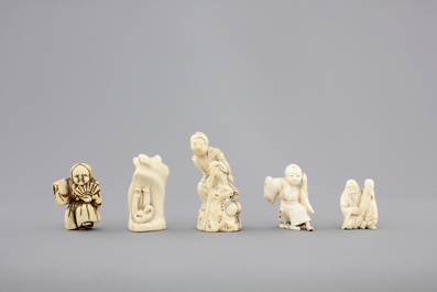 A set of 9 small Japanese ivory carvings, incl. netsuke, on a small red lacquer table, 19th/early 20th C.