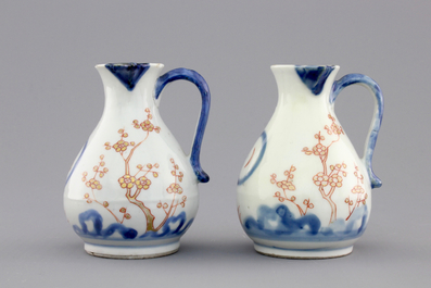 A pair of Japanese Arita porcelain oil and vinegar jugs, 18th C.