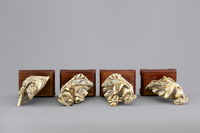 Four Chinese carved ivory ladies with instruments on wooden stands, ca. 1900