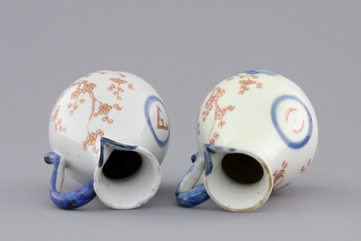 A pair of Japanese Arita porcelain oil and vinegar jugs, 18th C.