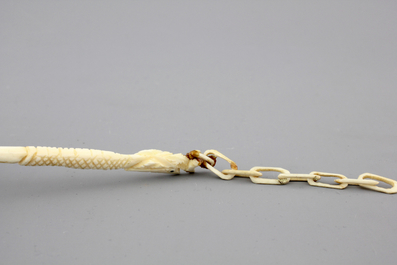 Two Chinese carved ivory figures, a hairpin and a brooch and a Japanese ivory pagoda, 19th C.