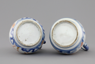 A pair of Japanese Arita porcelain oil and vinegar jugs, 18th C.