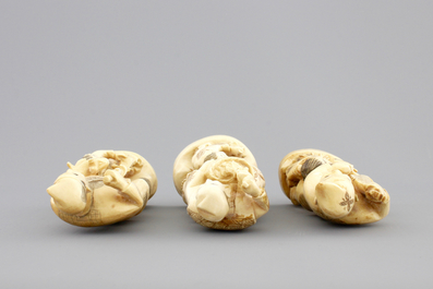 Three Japanese ivory carved okimono of fishermen with their son, Meiji, 19th C.