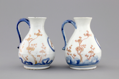 A pair of Japanese Arita porcelain oil and vinegar jugs, 18th C.