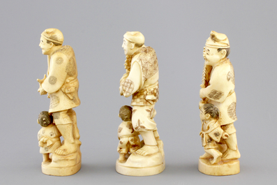 Three Japanese ivory carved okimono of fishermen with their son, Meiji, 19th C.
