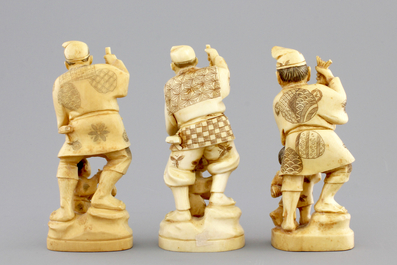 Three Japanese ivory carved okimono of fishermen with their son, Meiji, 19th C.