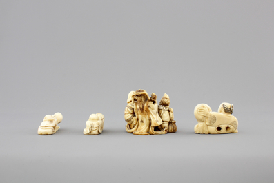 A set of 9 small Japanese ivory carvings, incl. netsuke, on a small red lacquer table, 19th/early 20th C.