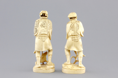 A pair of Japanese carved ivory fishermen, Meiji, 19th C.