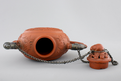 A Chinese silver-mounted open-worked Yixing stoneware teapot, 18th C.