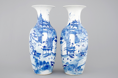 A tall pair of blue and white Chinese porcelain vases, 19th C.