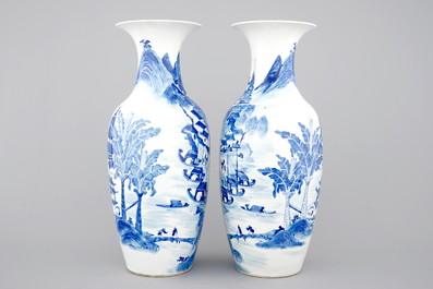 A tall pair of blue and white Chinese porcelain vases, 19th C.