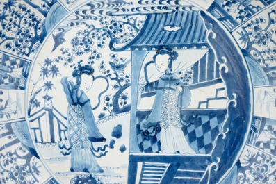 A very large blue and white Chinese dish with ladies in a garden, Kangxi, ca. 1700