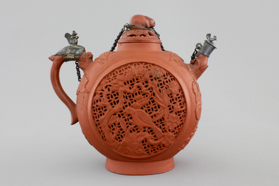 A Chinese silver-mounted open-worked Yixing stoneware teapot, 18th C.
