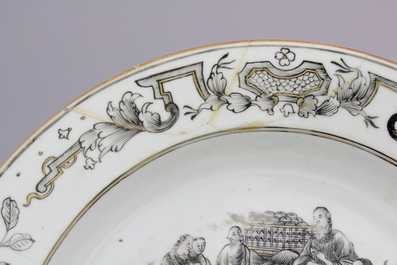 A Chinese export porcelain European subject grisaille and gilt decorated teapot stand and two plates, Qianlong, 18th C.