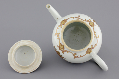 A Chinese porcelain famille rose and gilt armorial monogrammed teapot with a cup and saucer, 18th C.