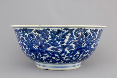 A large blue and white Chinese porcelain bowl with lotus scrolls, Kangxi, ca. 1680