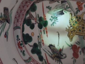 A pair of Chinese famille verte porcelain plates with deers and cranes, Kangxi, ca. 1700