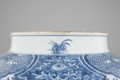 A tall blue and white Chinese porcelain landscape vase, early 18th C.
