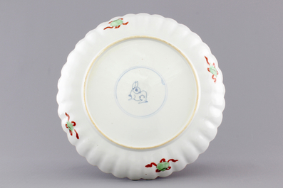 A fine lobed Chinese famille verte porcelain plate with a &quot;zotje&quot;, Kangxi, ca. 1700